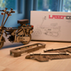 Illustration for article titled Buy The Hell Out Of This Awesome Little Laser-Cut Wooden Honda Motocompo Model